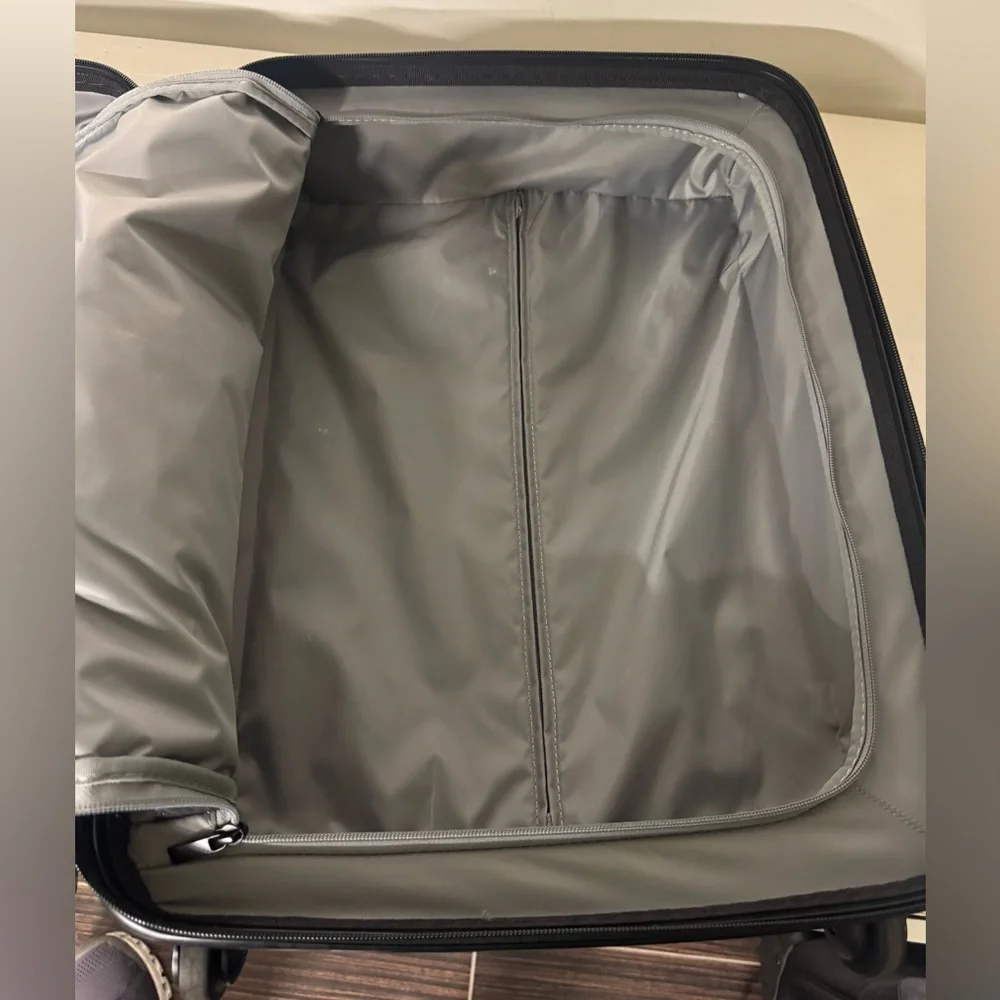 Tumi Vapor Silver and Black Hardside Spinner Carry-On